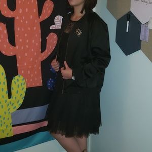 Bomber jacket with beaded and embroidered bugs